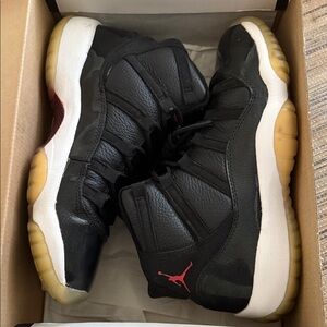 Jordan Air 11 Retro Black and Gym Red Sneakers